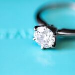 silver-colored Tiffany Jewelry ring with clear gemstone photo